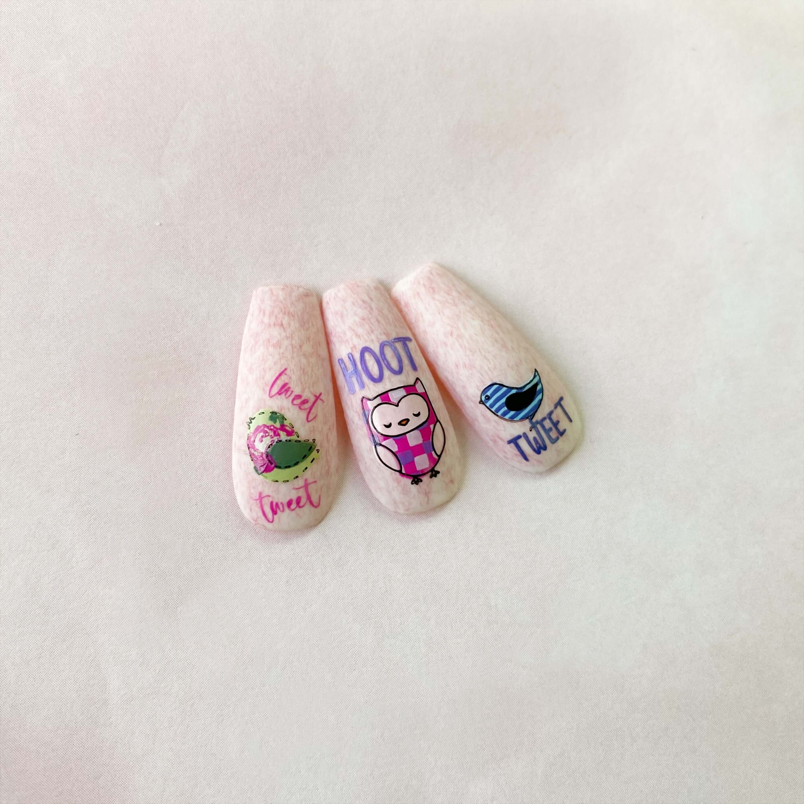 three-nail-tips-showing-nail-art-designs-of-birds-and-a-owl-with-words-tweet-hoot