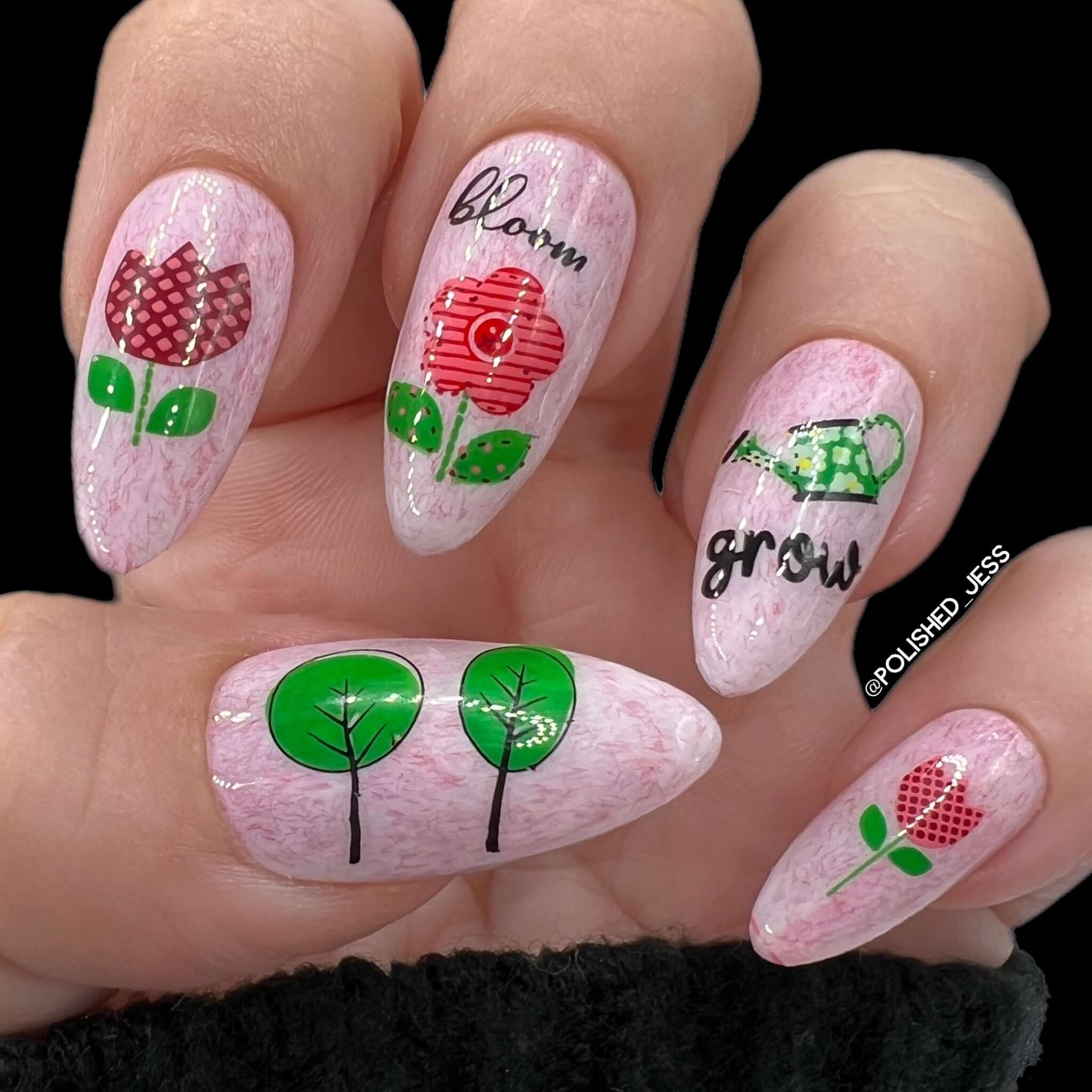 beautiful-manicure-with-flowers-a-watering-can-and-the-words-bloom-and-grow