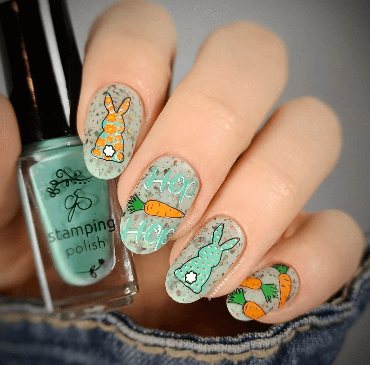 manicure-with-cute-nail-art-designs-of-rabbits-carrots-and-the-words-hop-hop