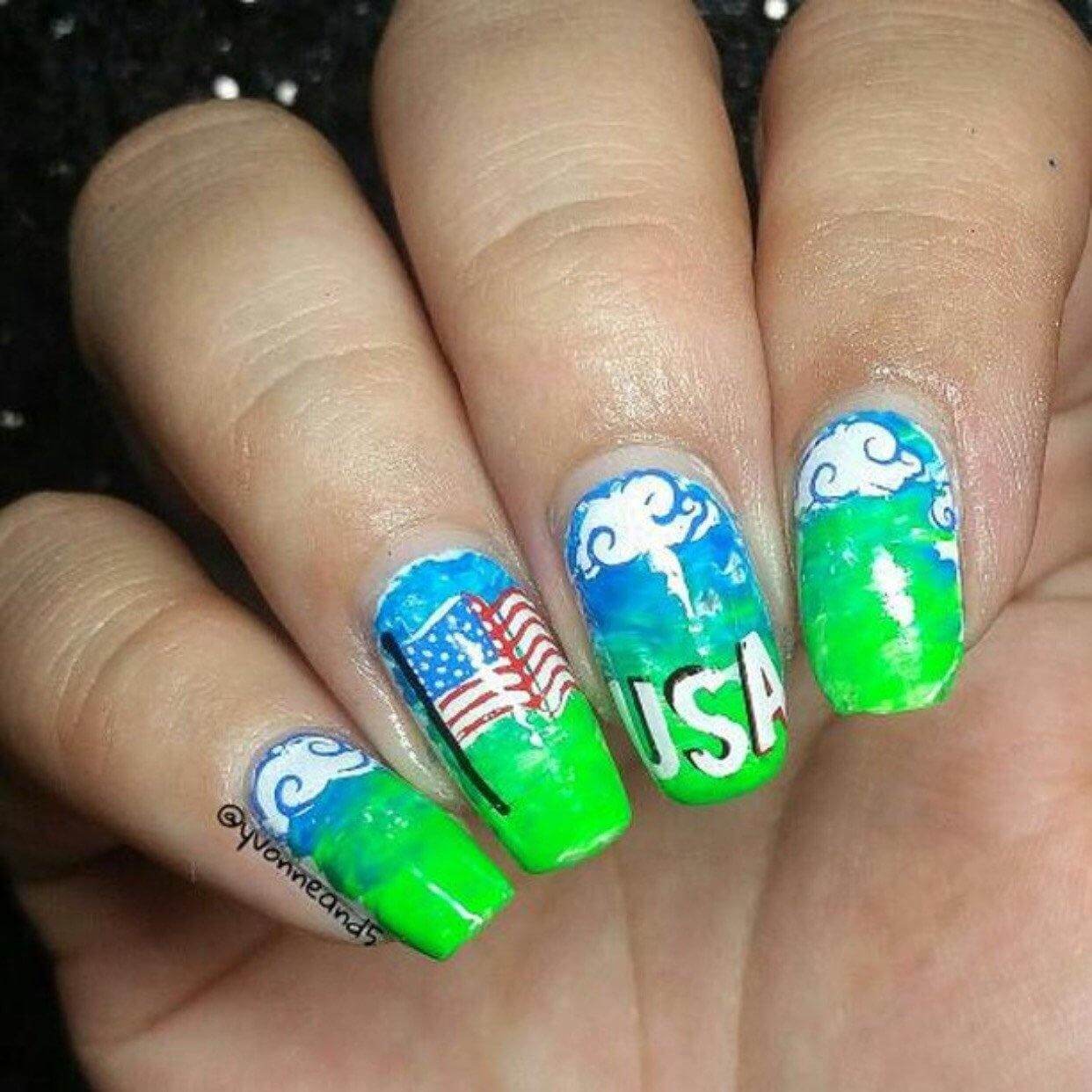 Bright-manicure-showing-nail-art-designs-of-the-usa-flag-and-clouds 