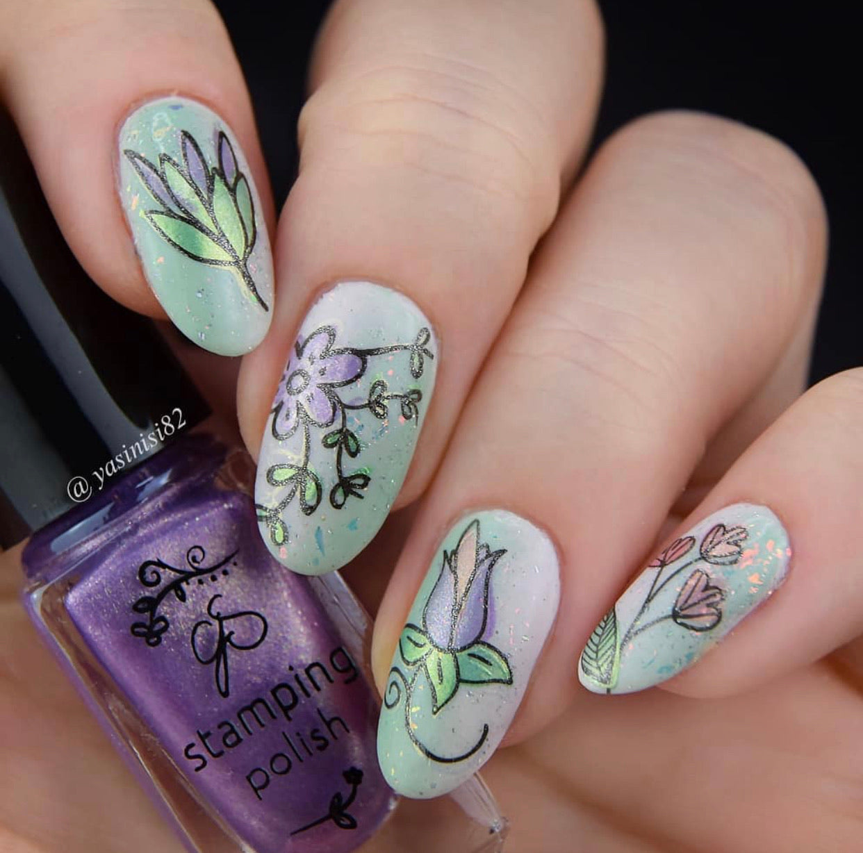 beautiful-floral-manicure-showing-nail-art-designs-of-flowers-and-leaves