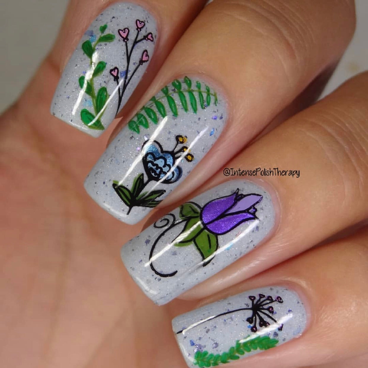 manicure-showing-floral-nail-art-designs 