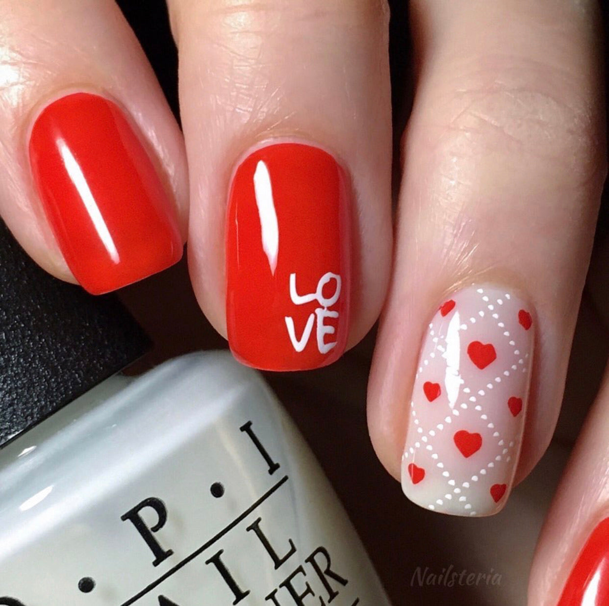 bright-manicure-with-the-letters-L-O-V-E-in stamping-nail-art