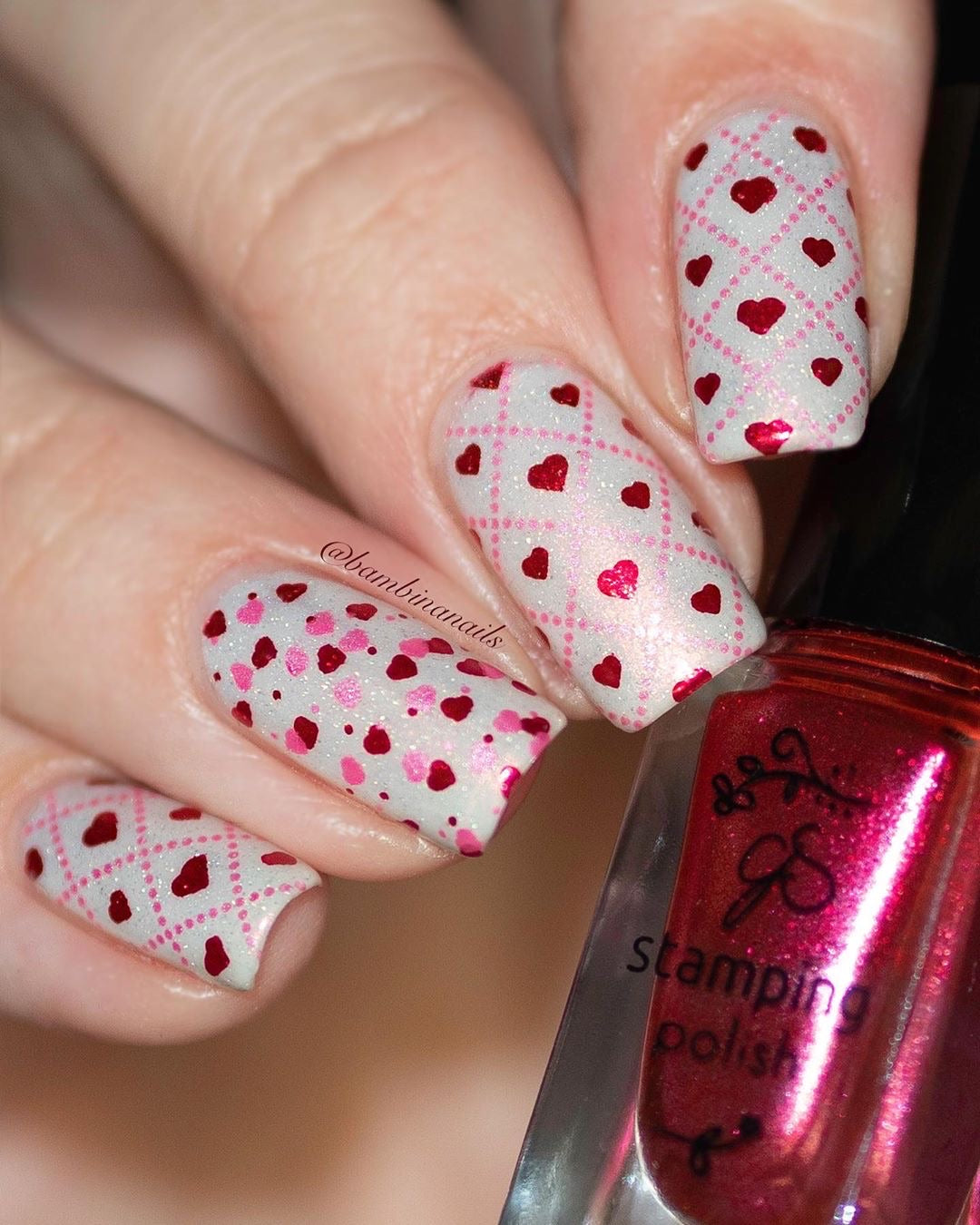 manicure-with-shimmery-checkered-heart-nail-art-designs