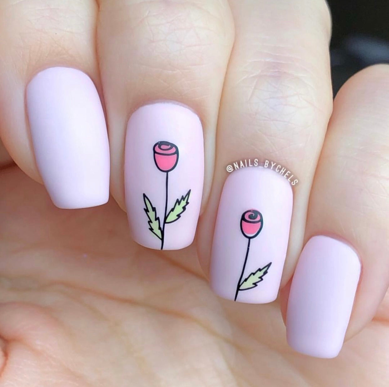 gorgeous-manicure-with-nail-art-designs-of-two-simple-flowers-with-leaves